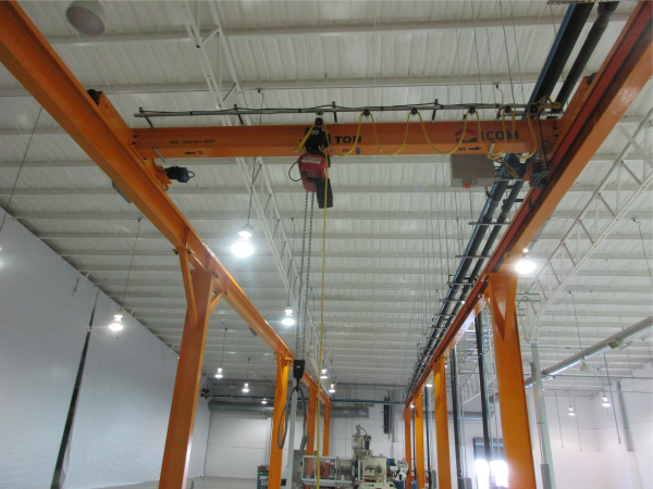 Grua viajera monorriel autosoportada con polipasto electrico de cadena marca CM_